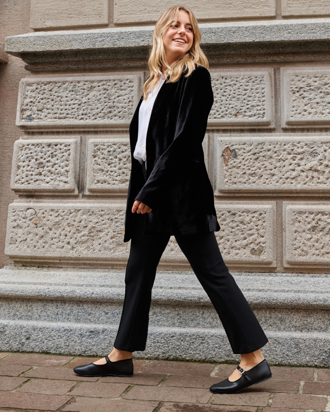 Benni wearing Le Orsine Black vegan friulane slippers