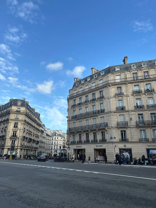 Travel A weekend in Paris: charming Parisian architecture against a blue sky.
