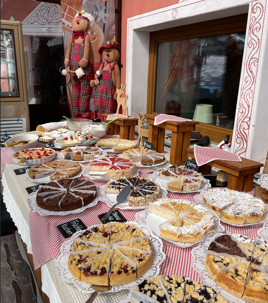 Trekking in Sankt Moritz and Sleeping at Lodge Chamanna Georgy: Delicious selection of homemade cakes and pastries.